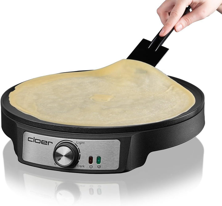 Cloer 6620 Crepe maker, for sweet or savory pancakes with a diameter of 29 cm, 1200 W, non-stick coating, with dough spreader and pancake turner, black